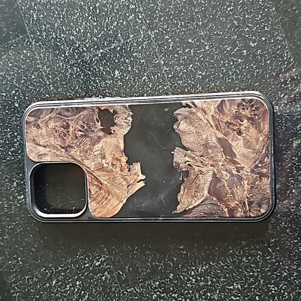 One of 1 CARVED case for iPhone 12 ProMax